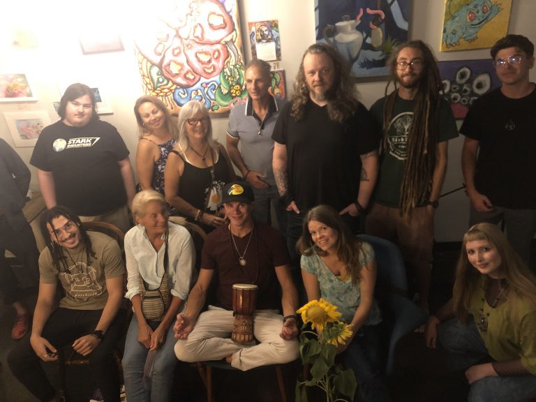 Sunflower Club open mic night in South Florida, a creative gathering of music, poetry, and self-expression